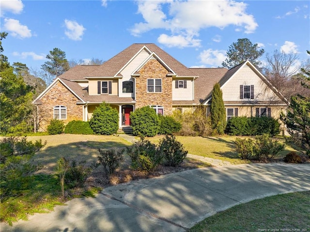 view of front of house with a front lawn