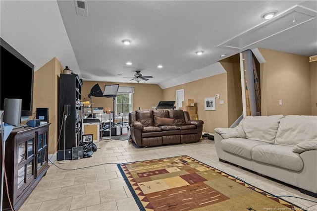 tiled living room with ceiling fan