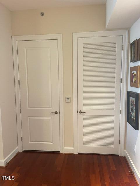 interior space featuring dark wood-type flooring