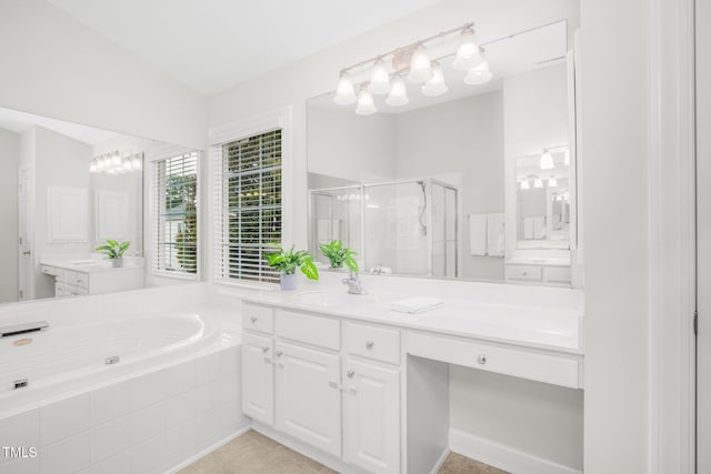 full bathroom with tile patterned flooring, a shower stall, a bath, and vanity