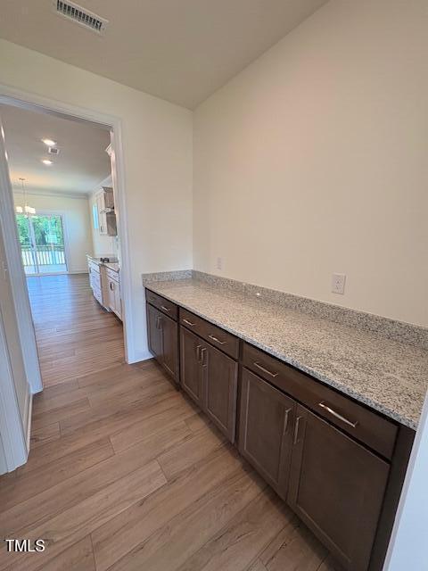 123 Sage Ln Unit 010, Four Oaks, NC 27524 - hallway featuring light wood-style flooring