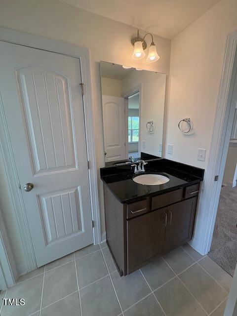 123 Sage Ln Unit 010, Four Oaks, NC 27524 - bathroom with tile patterned floors and vanity
