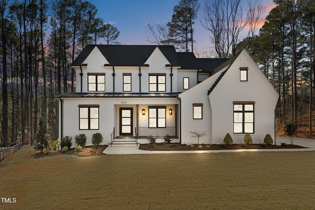 modern inspired farmhouse featuring a porch