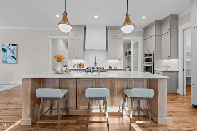 kitchen featuring light countertops and a large island