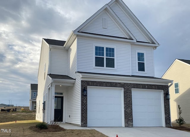 view of front of property featuring a garage