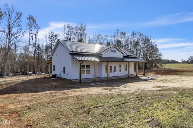 view of front of property featuring central AC unit