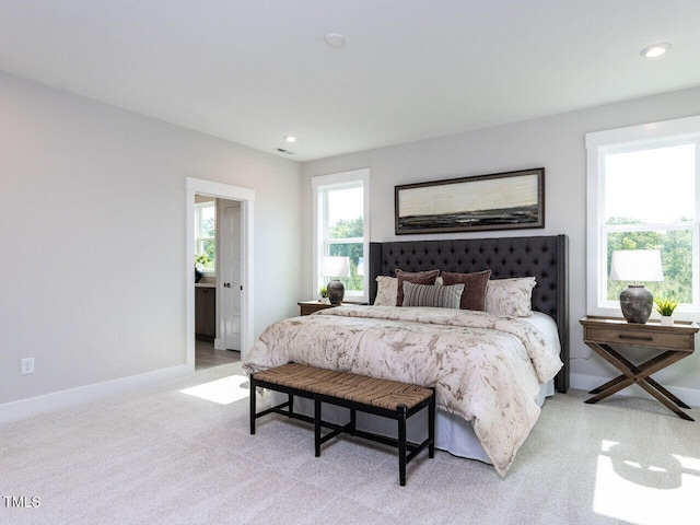 bedroom with light carpet, baseboards, and recessed lighting