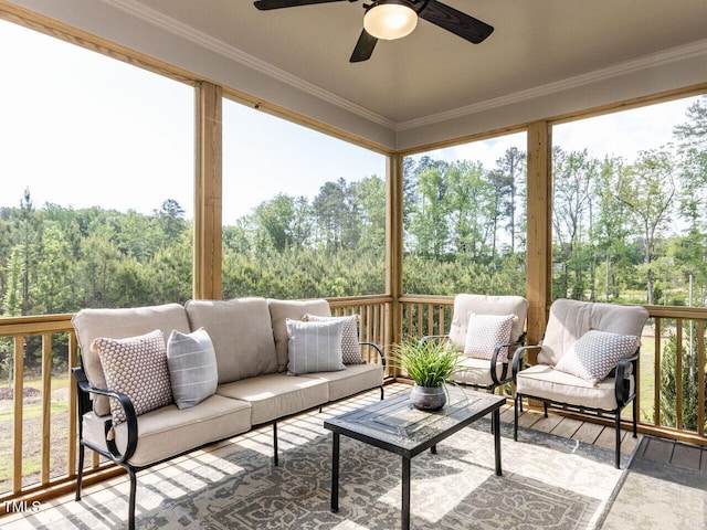 sunroom with outdoor lounge area, plenty of natural light, and ceiling fan