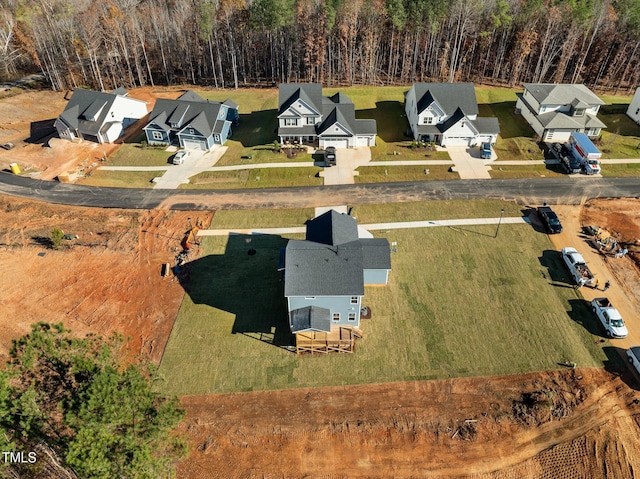 345 Sutherland Dr, Franklinton, NC 27525 - aerial perspective of suburban area featuring a heavily wooded area
