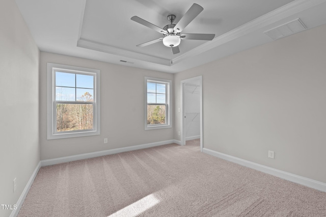 345 Sutherland Dr, Franklinton, NC 27525 - empty room with a tray ceiling, light colored carpet, a ceiling fan, and baseboards