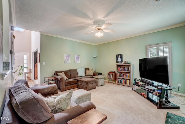 carpeted living room with crown molding, a textured ceiling, and ceiling fan