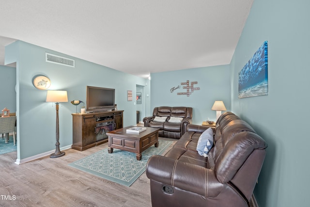 living room featuring light hardwood / wood-style flooring