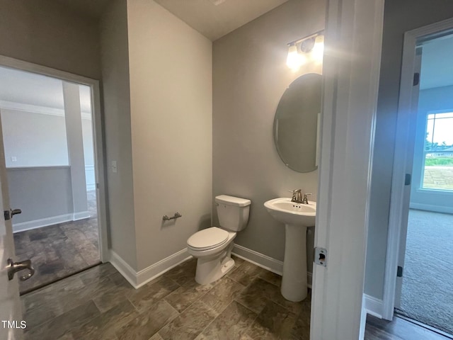 bathroom with sink and toilet