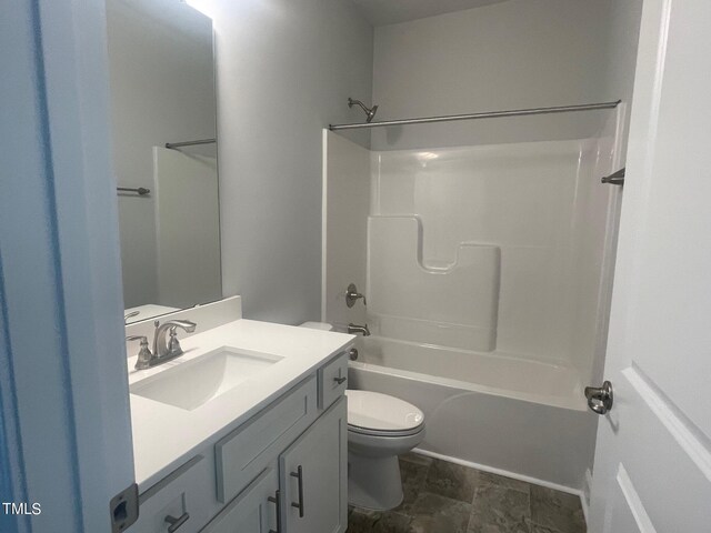 full bathroom featuring vanity, shower / bathtub combination, and toilet