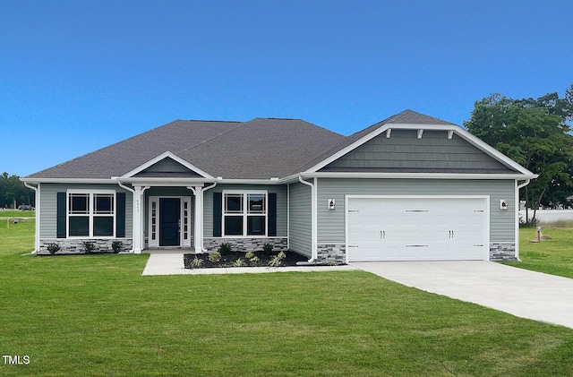 craftsman-style house with a garage and a front yard