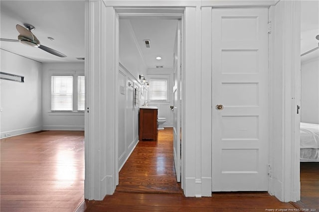 hall featuring dark wood-type flooring