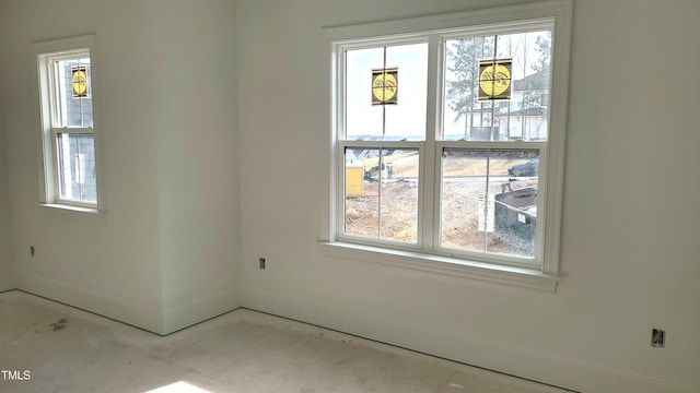 spare room featuring plenty of natural light