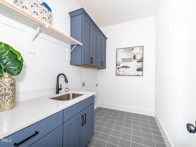122 W Beech Slope Ct, Chapel Hill, NC 27517 - laundry room featuring cabinet space, washer hookup, a sink, baseboards, and dark tile patterned flooring