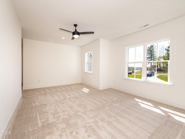 122 W Beech Slope Ct, Chapel Hill, NC 27517 - unfurnished room with baseboards, visible vents, light carpet, and ceiling fan