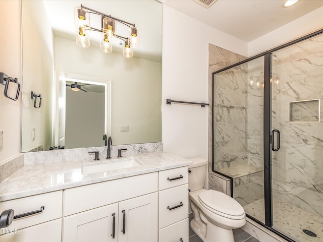 122 W Beech Slope Ct, Chapel Hill, NC 27517 - bathroom featuring vanity, toilet, recessed lighting, a ceiling fan, and a marble finish shower