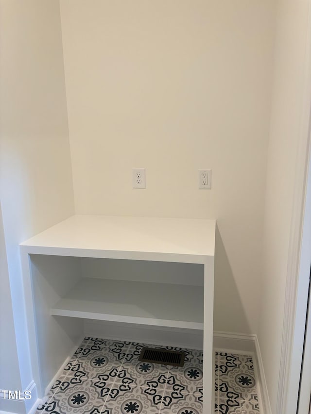 interior space with tile patterned floors