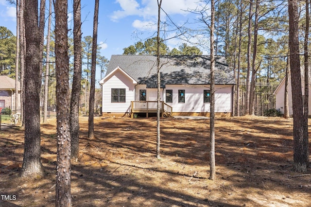 back of property featuring a deck