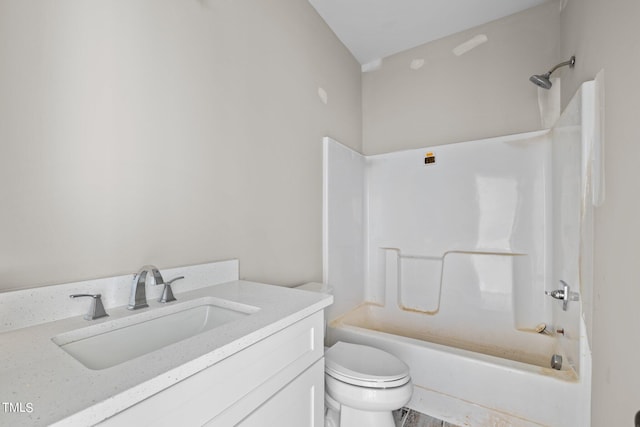 full bathroom featuring toilet, vanity, and shower / bathtub combination