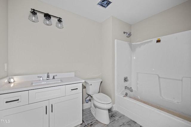 full bathroom with toilet, tile flooring, vanity, and washtub / shower combination