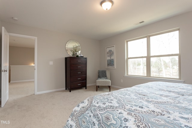 bedroom with light carpet