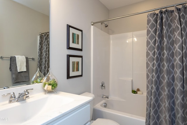 full bathroom featuring toilet, vanity, and shower / bath combination with curtain