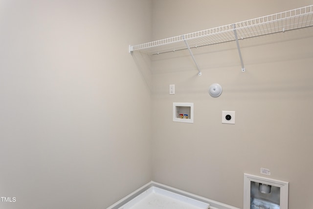 clothes washing area with hookup for a gas dryer, hookup for an electric dryer, and hookup for a washing machine