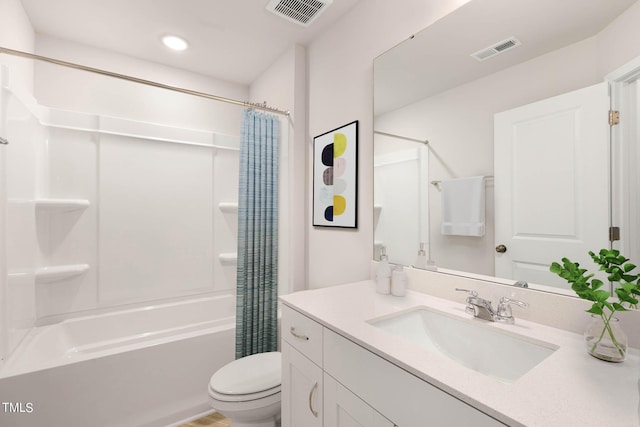 full bathroom featuring shower / bathtub combination with curtain, vanity, and toilet