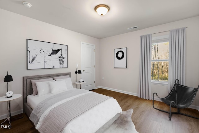 bedroom featuring hardwood / wood-style flooring