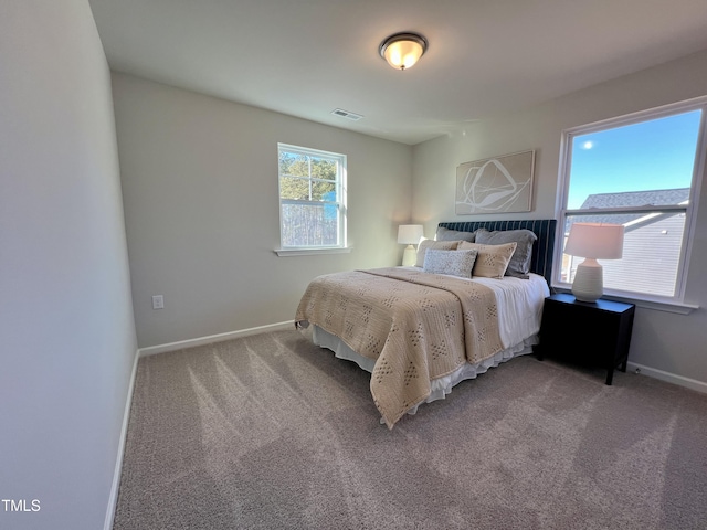 bedroom featuring carpet