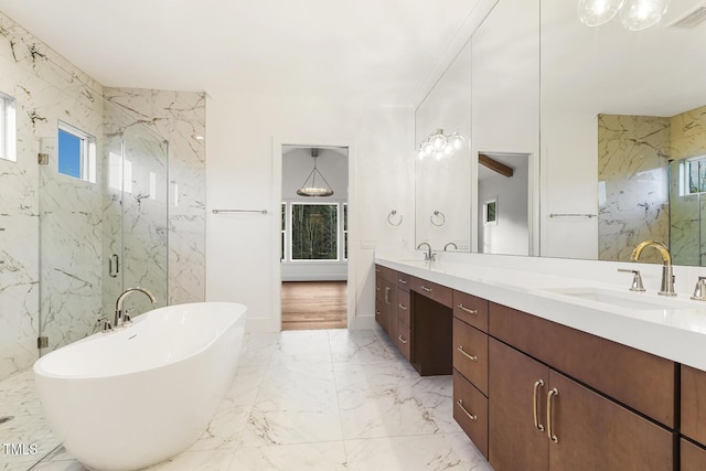 bathroom with vanity, plus walk in shower, and a healthy amount of sunlight