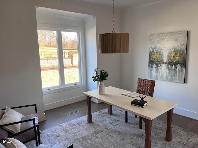 office space with hardwood / wood-style floors