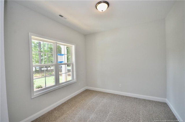 view of carpeted spare room