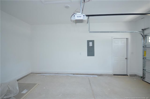 garage featuring a garage door opener and electric panel