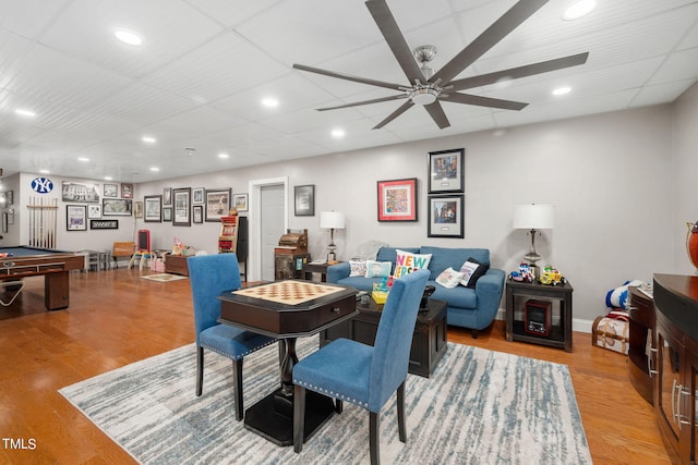 dining area with pool table, ceiling fan, a drop ceiling, and light wood-type flooring