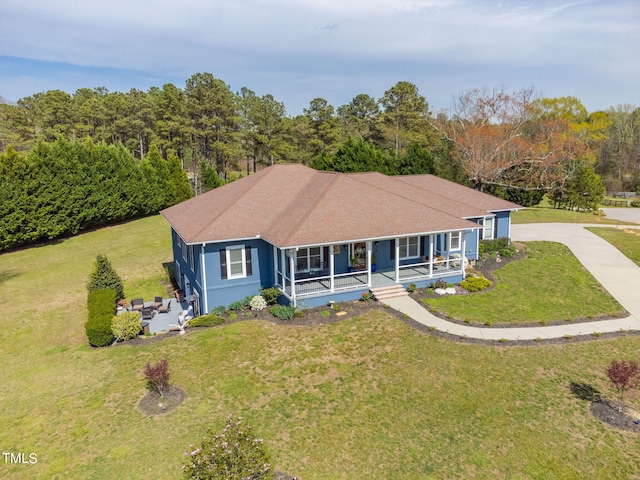 ranch-style house with a front lawn