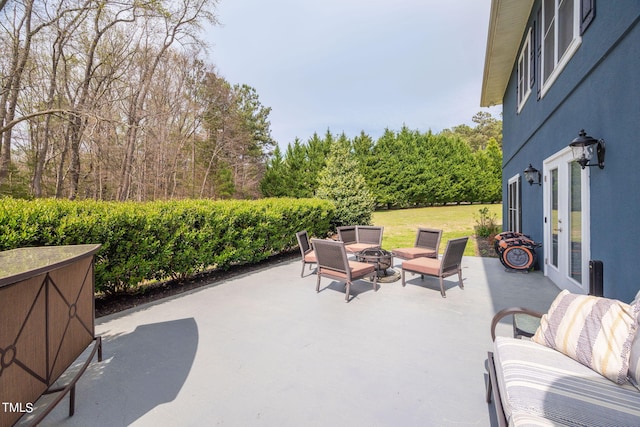 view of terrace featuring french doors and outdoor lounge area