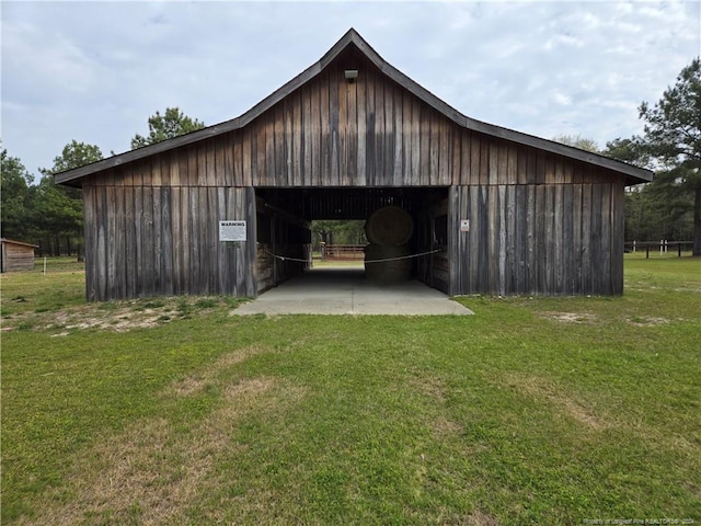 view of shed / structure with a lawn