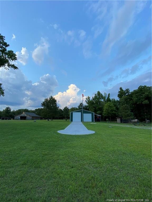 view of yard featuring a garage