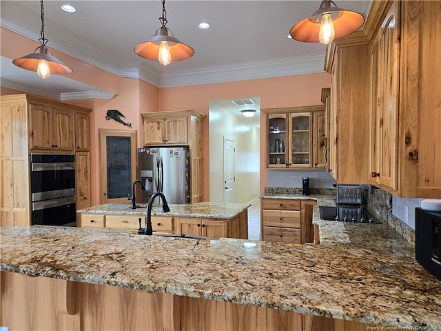 kitchen featuring stainless steel appliances, tasteful backsplash, ornamental molding, hanging light fixtures, and sink