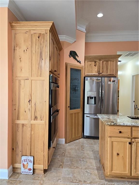 kitchen featuring double oven, light stone counters, light tile floors, and stainless steel fridge with ice dispenser