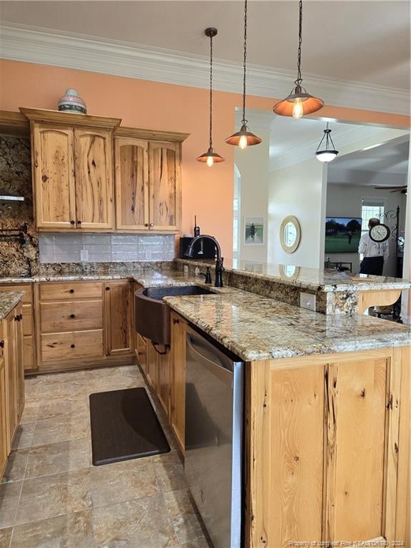 kitchen with light tile flooring, light stone counters, dishwasher, tasteful backsplash, and pendant lighting