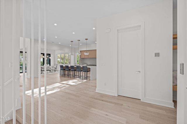 1435 Duplin Rd, Raleigh, NC 27607 - corridor with light wood-style flooring, recessed lighting, and baseboards