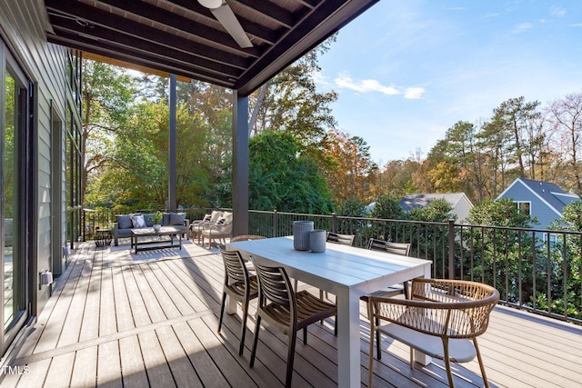 1435 Duplin Rd, Raleigh, NC 27607 - wooden deck featuring an outdoor living space, ceiling fan, view of wooded area, and outdoor dining space