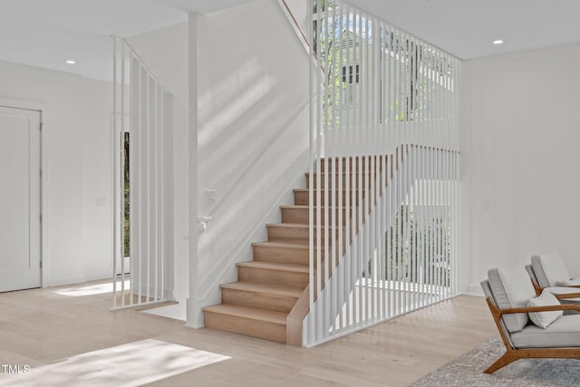 1435 Duplin Rd, Raleigh, NC 27607 - stairs featuring wood finished floors and recessed lighting