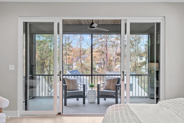 1435 Duplin Rd, Raleigh, NC 27607 - bedroom with multiple windows, wood finished floors, and access to outside
